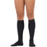 Black knee-high socks worn by a person on a white background